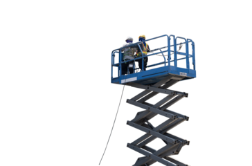 Construction worker wearing safety harnesses in mobile crane bucket at construction site. working at heights above ground ,safety for working at heights concept