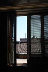Fototapeta premium open window to sunny balcony 