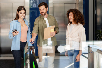 Business team entering office using electronic key card access control system