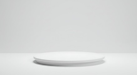 Bright minimalist white circular display podium in a clean studio setting, perfect for modern product showcasing