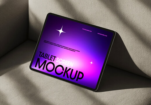 Realistic Tablet Screen Mockup on Sofa with Natural Shadows