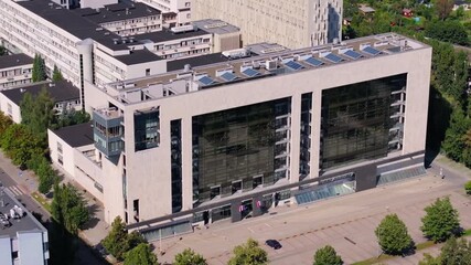 Telephoto aerial pass around Kraków’s District Court, highlighting its role in the Polish judiciary, law, and the rule of law.