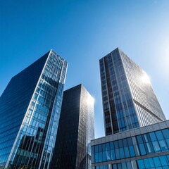 Obraz premium Modern skyscrapers against a clear blue sky