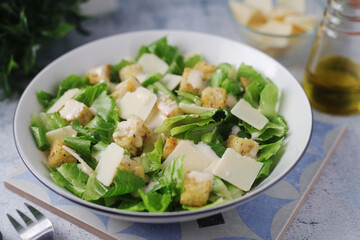 A bowl with classic Caesar salad