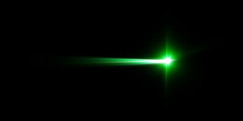Bright green laser beam cutting through darkness.