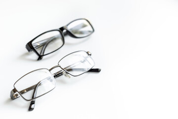 Eye care concept. Group of glasses on white background