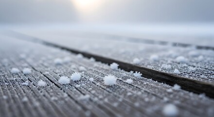 Detailed view of frost crystals on wooden surface capturing the ethereal beauty of winter's delicate touch