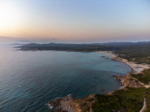 Aerial view of the sunset on the beaches of Rena Majore and Matteu