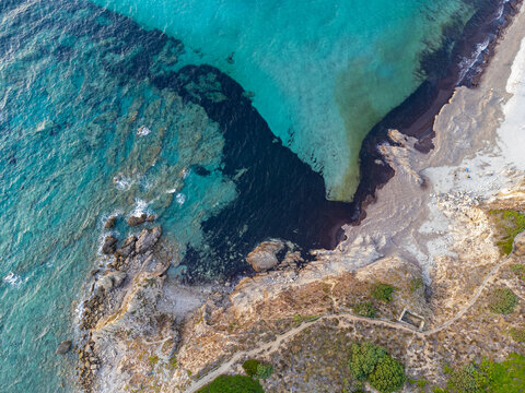 Aerial view of the sunset on the beaches of Rena Majore and Matteu