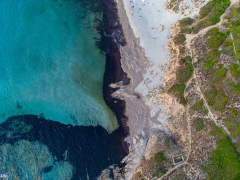 Aerial view of the sunset on the beaches of Rena Majore and Matteu