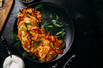 Golden Potato Pancakes with Sour Cream . draniki