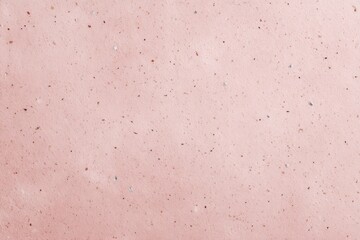 Fototapeta premium Soft Pink Textured Surface with Subtle Speckles and Variation
