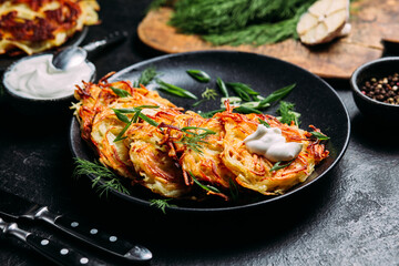 Golden Potato Pancakes with Sour Cream . draniki
