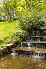 Cascading waterfall in the park. Baden-Baden. Germany