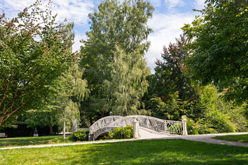 Curved bridge over the Ooz River. Baden-Baden. Germany