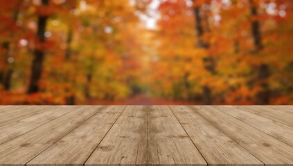 Empty wooden table top with a blurred autumn forest background for product display or mockup