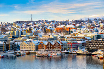 Tromso harbor with houses, fjord, cruise ships and downtown on sunny winter day Norway travel