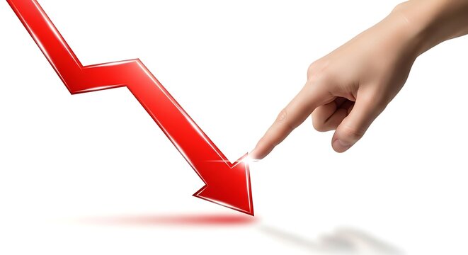 Hand pointing at a sharp downward trending red arrow indicating financial loss and economic downturn