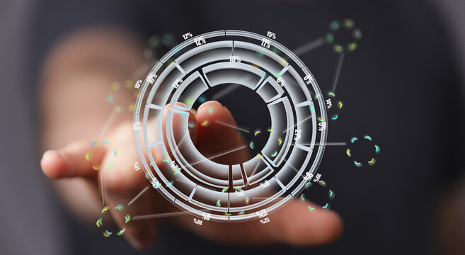 Person interacting with a digital circular chart, showcasing data analysis and technology.