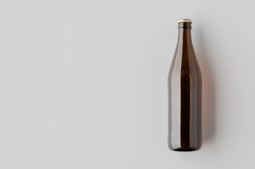 Fototapeta premium Beer bottle mockup with blank copyspace, amber glass
