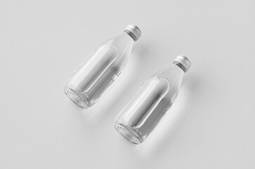 Naklejka premium Small water bottle mockup, clear glass