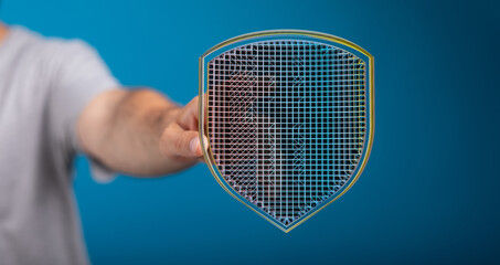 Hand holding a digital shield,cybersecurity, data protection, network security.
