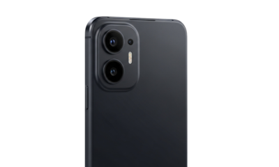 A close up shot showing the dual camera setup on the back of a modern smartphone device