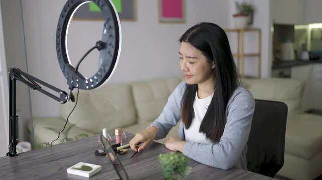 Thai Beauty Vlogger Recording Skincare Tutorial at Home