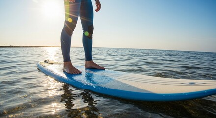 Person stand-up paddleboarding.