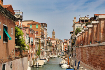 Historic Buildings and Canal in Venice, Italy. A classic view of a narrow canal in Venice, Italy