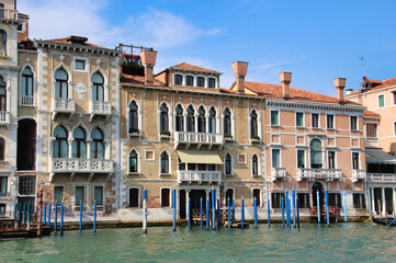 Gondola on Grand Canal with Historic Venetian Buildings.  
