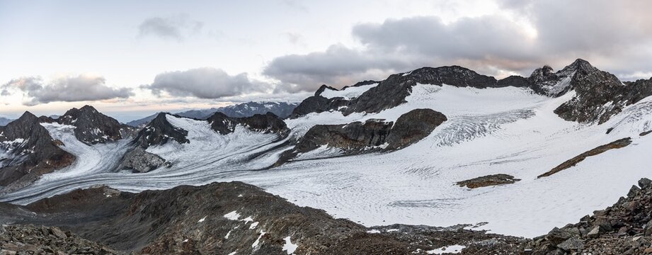 Sunset at the summit of the Becher, picturesque high mountain landscape, view of mountain peaks K&ouml;nigshofspitz and Sonklarspitze and Schwarzwandspitz with glacier of the &Uuml;beltalferner, Stubai Alps, South Tyrol, Italy