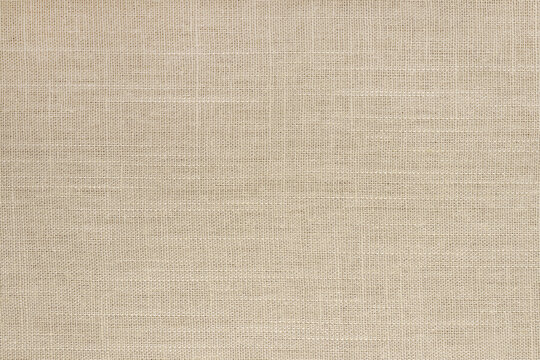 Brown linen fabric cloth texture background, seamless pattern of natural textile.