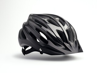 Fototapeta premium Black bicycle helmet isolated on white background symbolizing safety and protection.