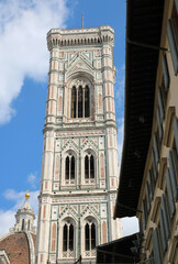 Fototapeta premium Close-up of the Giotto's bell tower (campanile) in Florence, Tuscany, Italy. Vertical photo.
