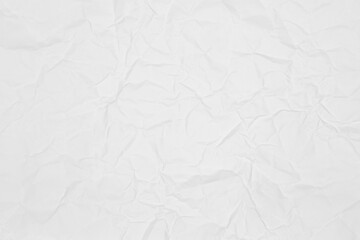 White crumpled paper texture background. Wrinkled, creased sheet for a vintage abstract grunge surface or backdrop.
