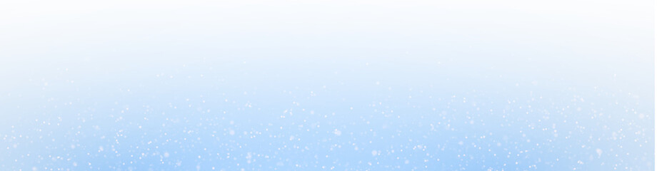 Blue dust sparkle with glowing festive particles.