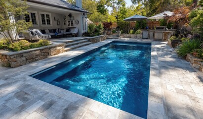 Backyard swimming pool with patio area