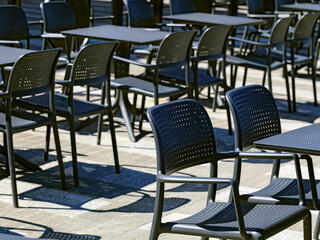 The seats at this outdoor cafe are not taken
