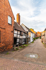 A view down Quonians Lane leading from Dam Street in Lichfield, UK in summertime