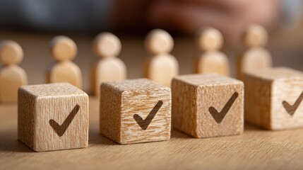 Wooden blocks with checkmarks, alongside small wooden figures