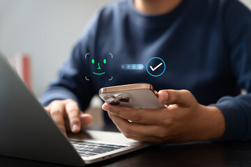 Person using smartphone with facial recognition and virtual password interface, Representing biometric authentication, Secure login, and digital identity protection in modern data security systems.