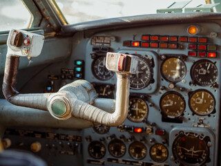 Cockpit with a control wheel and panel