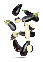 Fresh ripe eggplants falling on white background