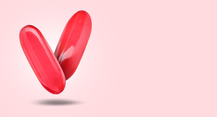 Pills falling against pink gradient background. Banner design with space for text
