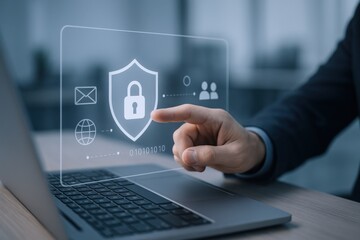 Data Protection Concept: Businessman Activating a Secure Firewall Interface on a Laptop, Enhancing Cyber Security