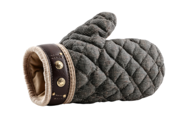 Stylish oven mitt with quilted pattern and leather trim on transparent background