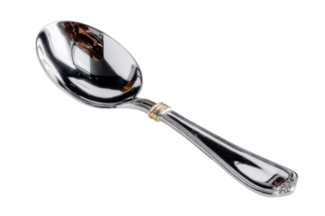 Elegant silver spoon with gold accent on a black backdrop kitchen utensil shot on transparent background