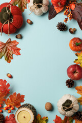 Autumn flat lay background with fallen leaves and pumpkins.