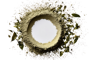 Circular ring of light green powder surrounds a white circle.  Dried, light green leaves and small specks are scattered around the powder ring.  Dark background